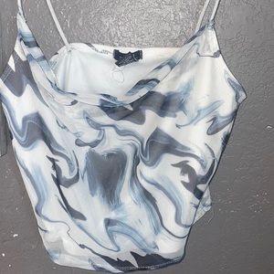 This is a really cute cropped marble tank, great for summer!